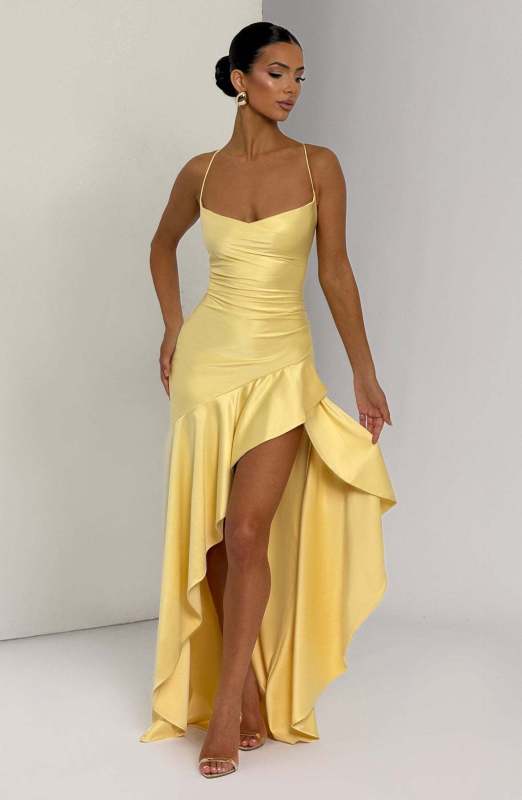 Sexy halter dress with ruffled, irregular hem.